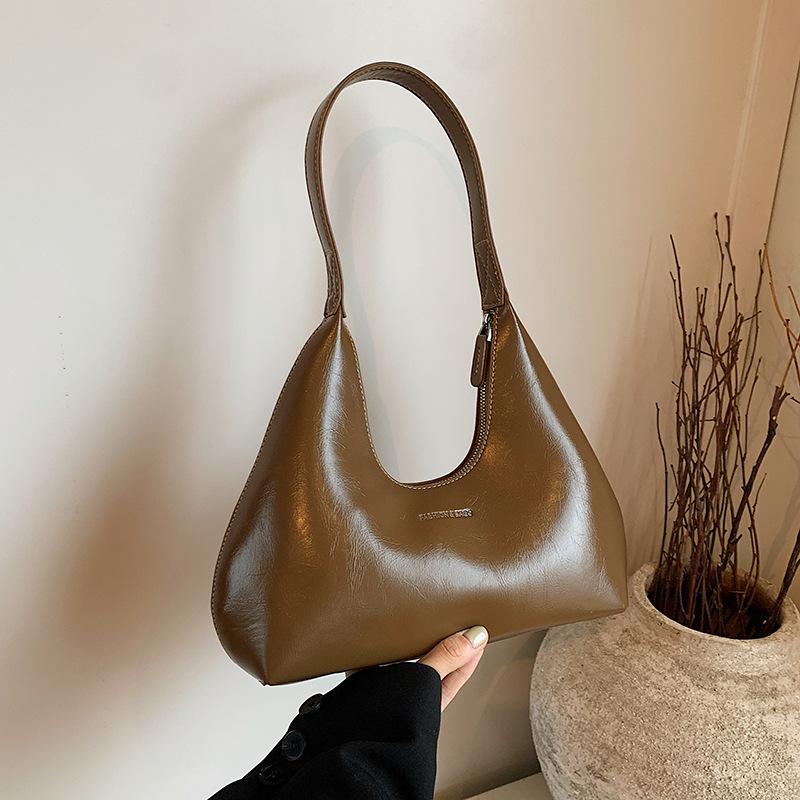 Сумка-пельмень из высококачественной фактуры в стиле ретро, универсальная маленькая сумка для поездок на работу, женская сумка на осень и зиму 2024 года, новая сумка через плечо