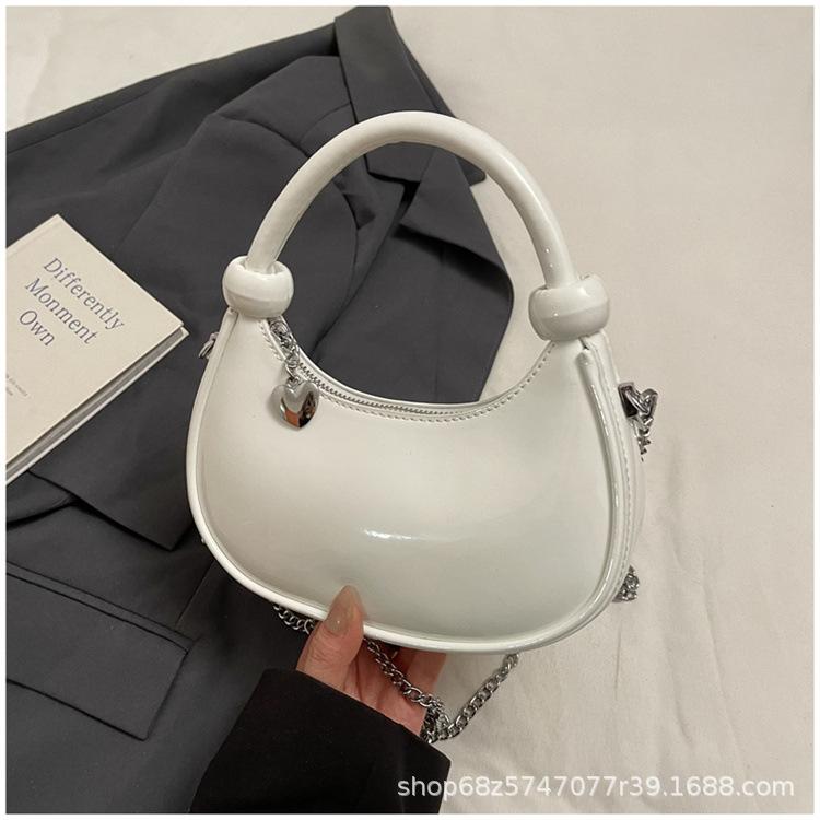 Hand Carry Fashion Trend Dumpling Bag Women 2025 New Simple Versatile Patent Leather Shoulder Bag Niche Design Messenger Bag