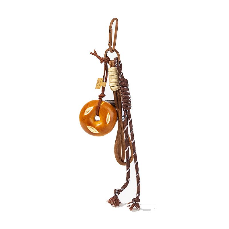 Yogodlns Подвеска в виде рогалика с щелочной водой, симпатичное улыбающееся лицо, плетеная веревочная сумка, аксессуар ручной работы, модный подарок