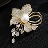 Luxurious Appeal| Elegant Golden-Tone Flower Brooch Pin with Sparkling Crystals Pearl Accent - Chic Fashion Accessory for Women Dresses Blazers