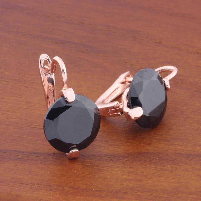 Простые и элегантные круглые серьги с розовым цирконом и застежкой-левербек