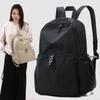 Корейский женский нейлоновый рюкзак весна-лето 2025: Модный однотонный повседневный школьный ранец для студентов