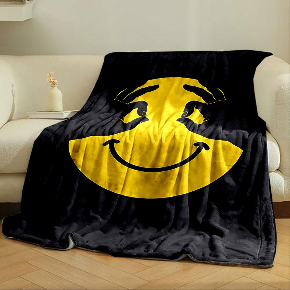 A yellow smiley face with hands forming eyes on a black background. for all seasons blanket lunch break throw gift