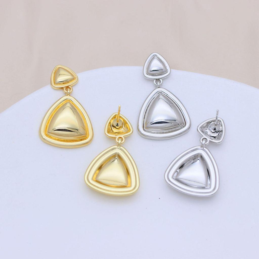 Геометрические серьги-подвески в виде треугольников из серебряных игл S925 с отделкой из настоящего золота