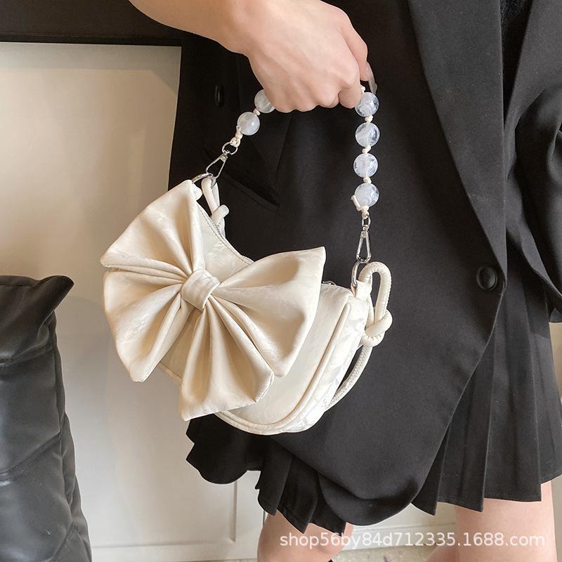 Bow Fashion Women's Small Bag Women's 2025 Spring New Versatile Simple Shoulder Messenger Bag Texture Dumpling Bag
