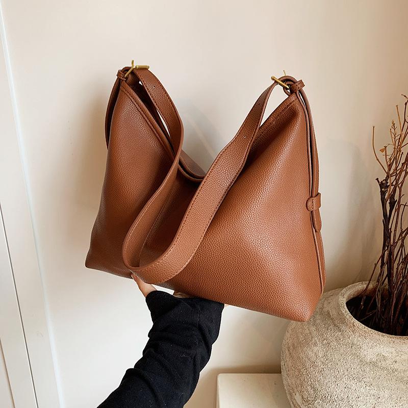 Премиальная сумка для поездок на работу женская 2024 новая повседневная универсальная сумка через плечо подмышкой простая темпераментная сумка-ведро