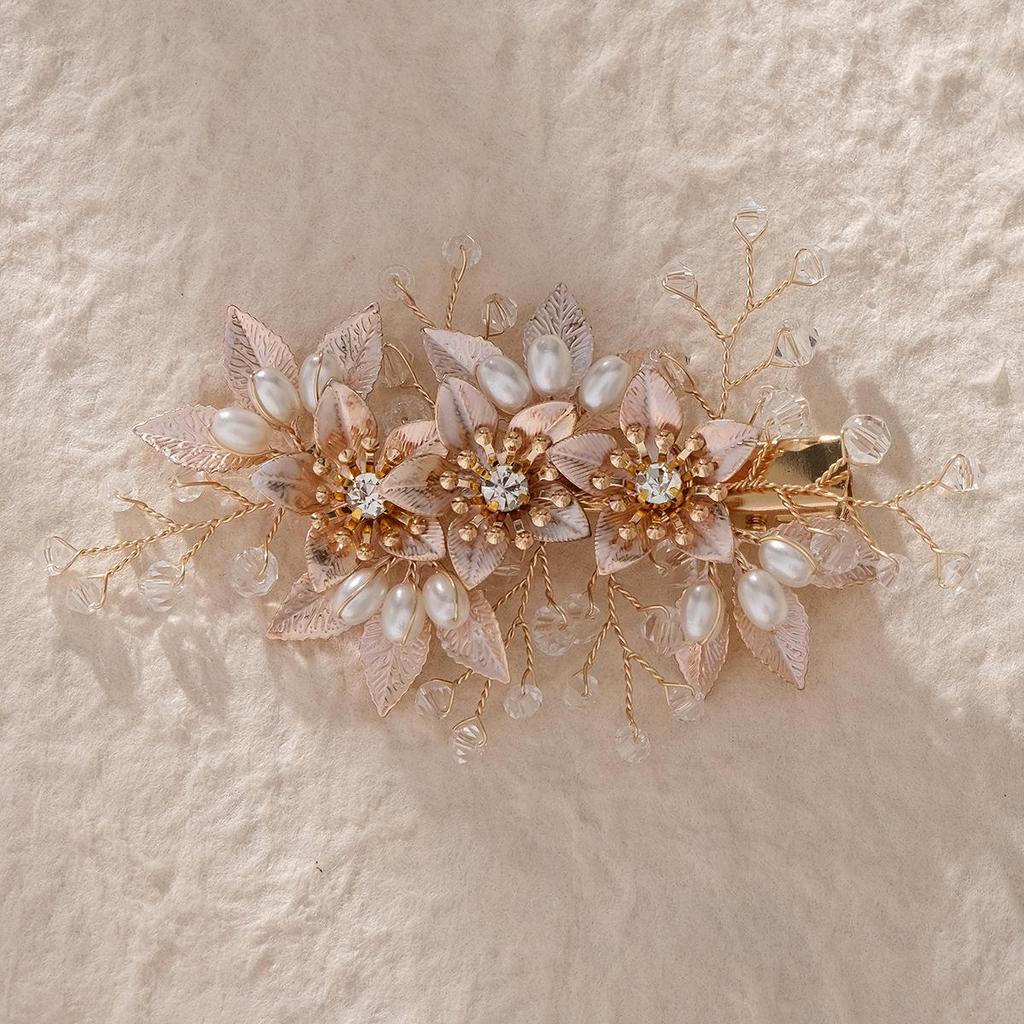 Сделанный вручную свадебный гребень для волос с цветком из жемчуга и страз и листьями