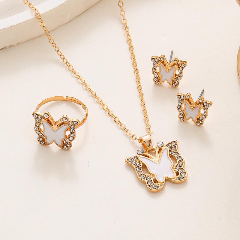 Shein Trendy Butterfly Jewelry Set: High-End Diamond Hollow Necklace, Ring & Earrings for Women - European & American Fashion.