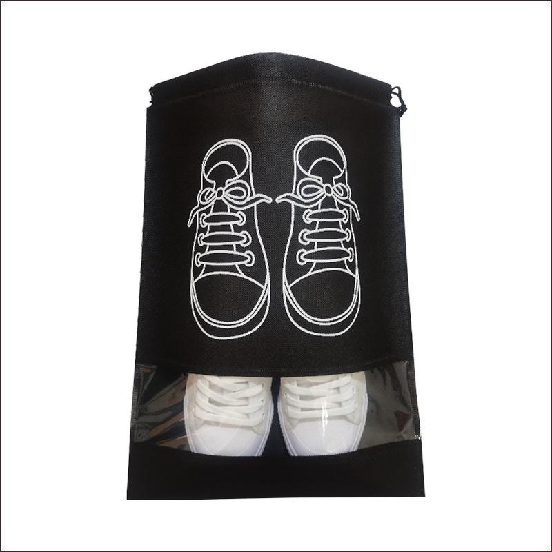 Dustproof & Moisture-proof Non-Woven Shoe Storage Bag with Drawstring for Travel Organization.