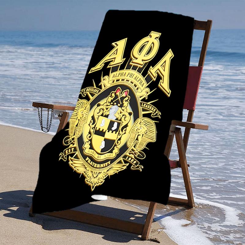 proof beach towel with a Alpha Phi Alpha logo pattern - soft,absorbent,quick-drying,machine washable - perfect for swimming,camping,bathing