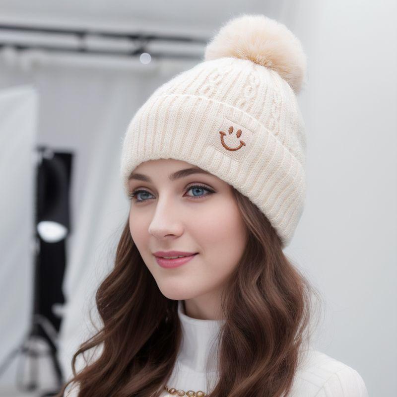 Women's Fleece-Lined Pom Pom Knit Hat - Warm, Versatile, with Ear Protection for Autumn & Winter.