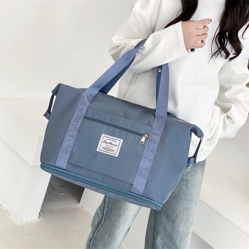 Женская деловая дорожная сумка: Портативный, вместительный чемодан с функцией разделения на сухое и влажное для одежды и спортивного снаряжения