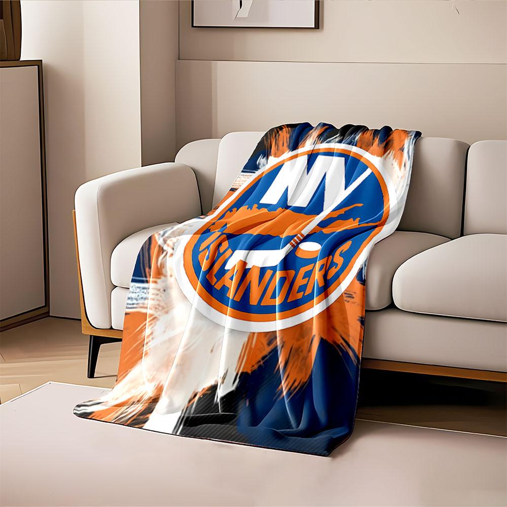 Circular logo with "NY Islanders" text, hockey stick, puck, and island. for all seasons blanket lunch break throw gift