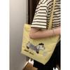 Canvas bag design sense niche underarm bag women 2025 new simple cartoon puppy tote bag shoulder bag portable