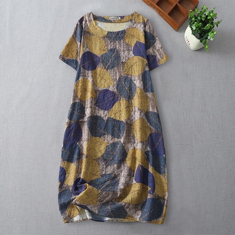 summer new loose printing medium and long dress that covers the belly and shows thinness