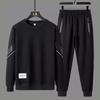 Men's Plus Size Casual Two-Piece Set: Round Neck Sweatshirt & Sweatpants for Spring/Autumn - Loose, Versatile, Fashionable.