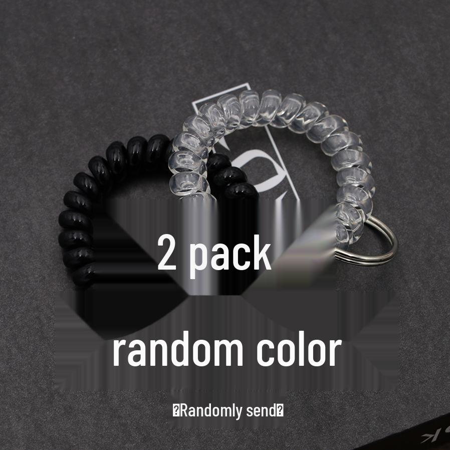 Минималистичный браслет-брелок и резинка для волос в виде пружинного механизма