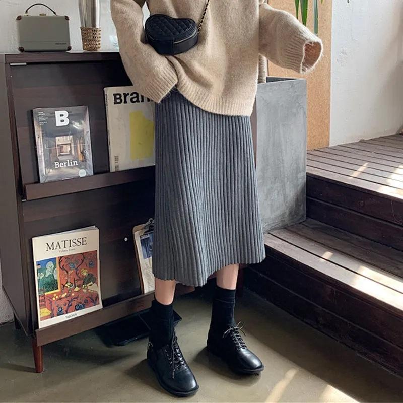 Женские юбки Осень и зима без разрезов Трикотажные юбки средней длины с высокой талией Тонкая юбка трапециевидной формы