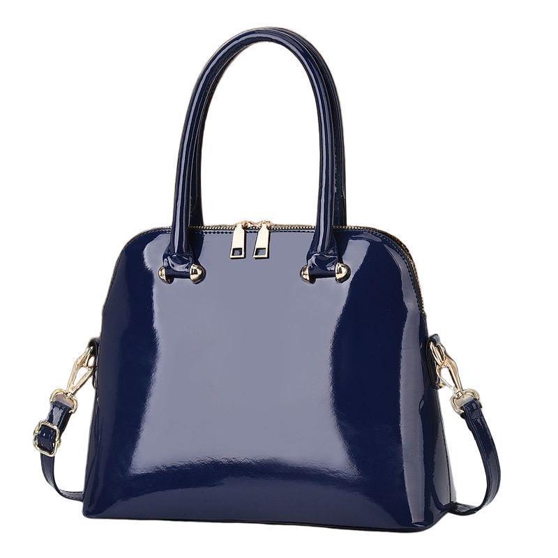 Женская лаковая сумка-тоут 2025: Универсальная европейская и американская модная сумка, ручная, на плечо или через плечо, красного и черного цвета.