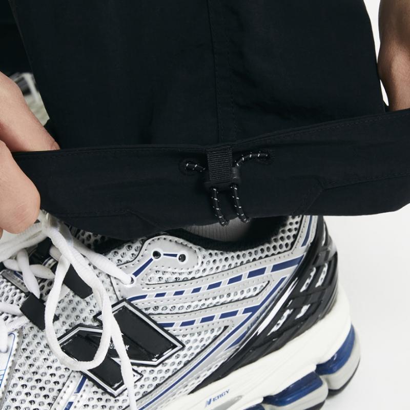 New Balance Nbnte11013 Uni Ess Heritage Woven прямые брюки черные 