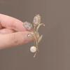 Elegant Tulip Zircon Leaf Brooch with Pearl Accent