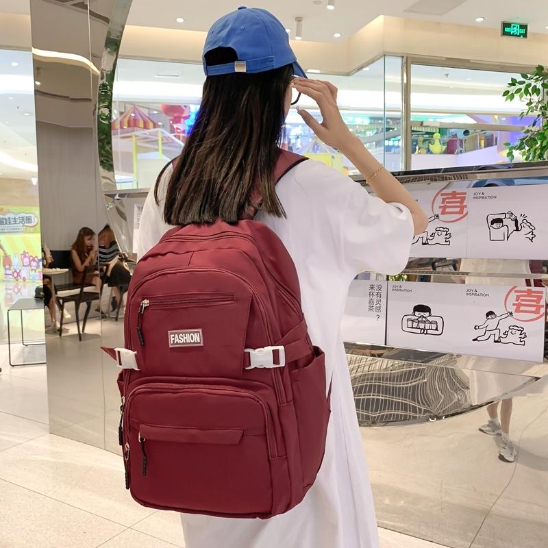 IELGY Korean Version of the Casual Large-capacity Backpack Female Simple Primary School Junior High School Student Bag