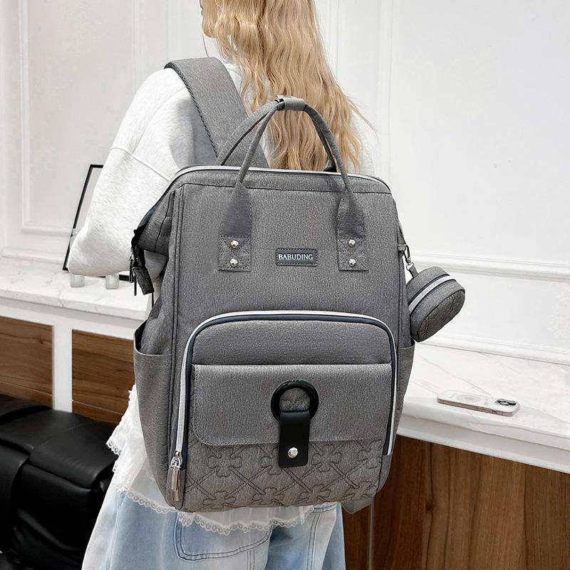 New style mommy bag with large capacity, patchwork design, contrasting colors, versatile and fashionable, waterproof, and designed as a backpack