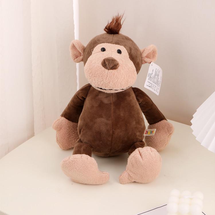 Мягкие игрушки лесных животных: Куклы лев, тигр, слон, енот