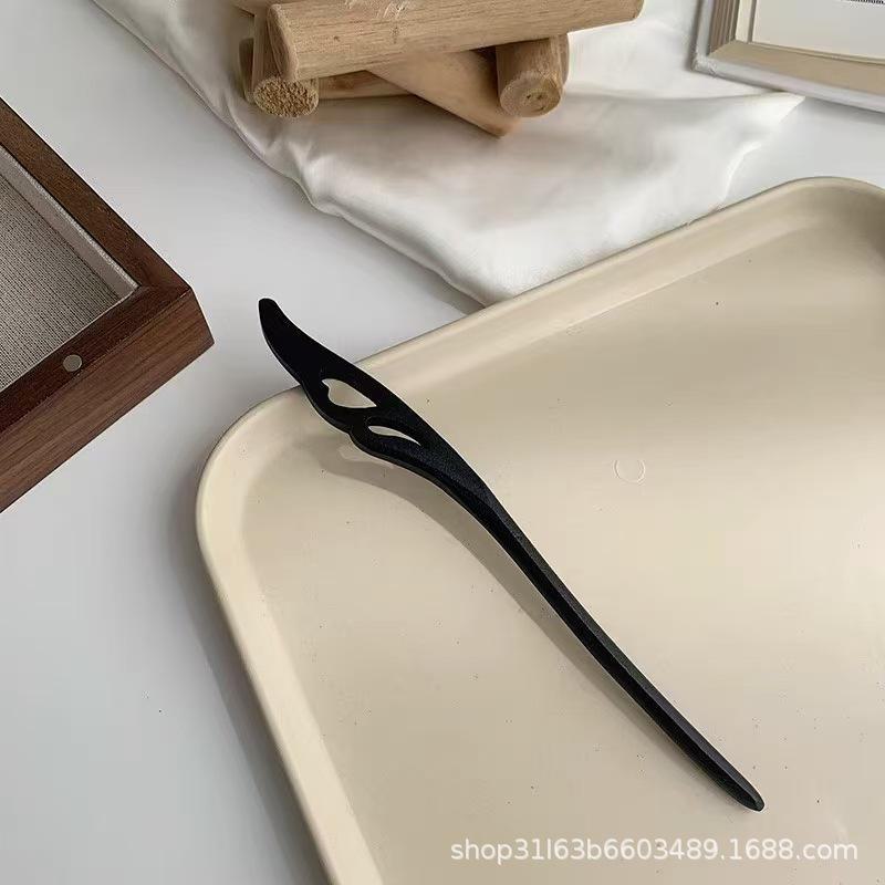 Элегантная шпилька из черного дерева: Современная простота в сочетании с древним китайским стилем