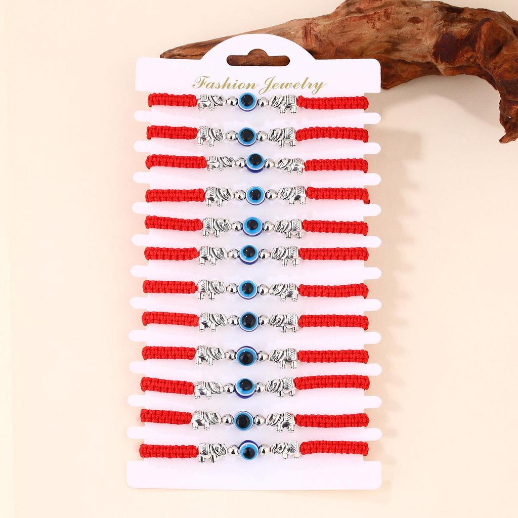 Набор браслетов из красной нити с синим сглазом - Ручная работа, плетеный дизайн