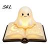 Ghost Figurine Desk Lamp Magic Book Night Light, Resin Tabletop Warm Glow with Moon Cute Light Star Relief, Bedside Sleeping for Kids Bedroom,