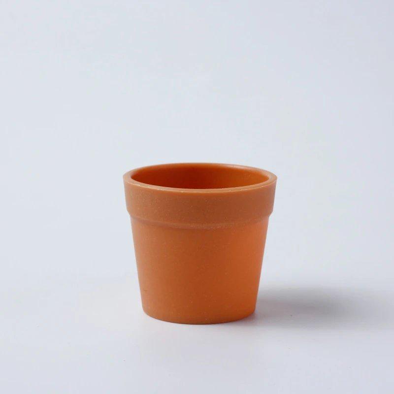 Mini Potted Plant: Handmade White Anti-Fall Ceramic-Style Flower Pot with Crochet Design and Artificial Lawn.