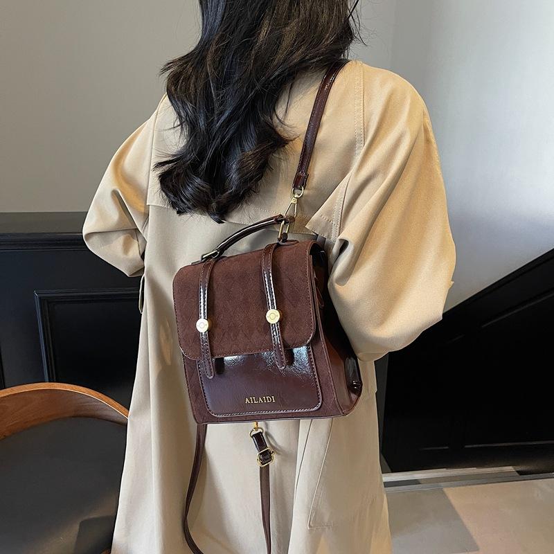 Премиальный ретро женский рюкзак 2025 новый контрастных цветов универсальный маленький рюкзак модный дорожный маленький школьный рюкзак