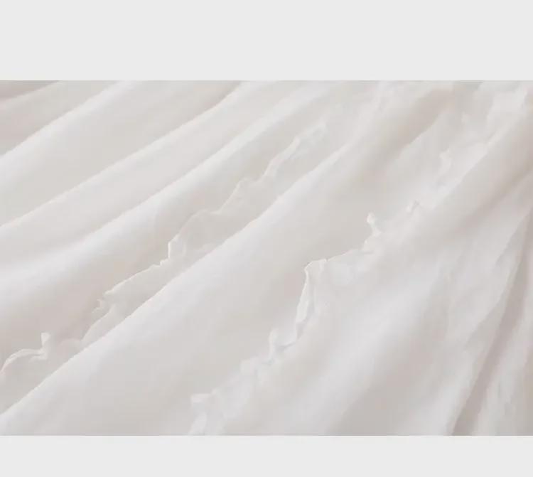 Trendy Cotton-Linen High-Waisted A-Line Skirt: Mid-Length with Ruffled Edges for a Slimming, Drapey Fit.