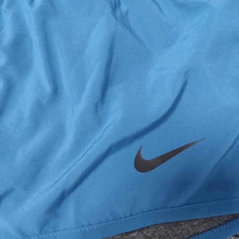 Nike Однотонные эластичные двухсторонние повседневные шорты для женщин, синие 830457-457
