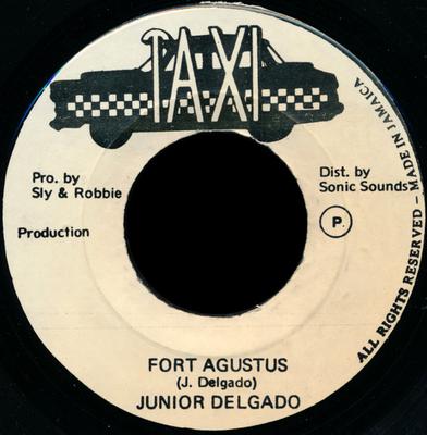 7-дюймовая пластинка JUNIOR DELGADO - Fort Agustus NONE Taxi 1980 Ямайка Регги, Ска и Даб Б/У
