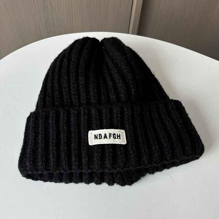 Autumn and winter cloth label ins candy-colored knitted hat children's versatile thickened warm and cold ear protective wool hat