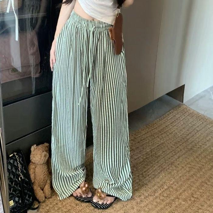 Корейские повседневные брюки в вертикальную полоску для женщин. Летние новые свободные брюки-пузыри в полоску с широкими штанинами. Универсальные брюки.