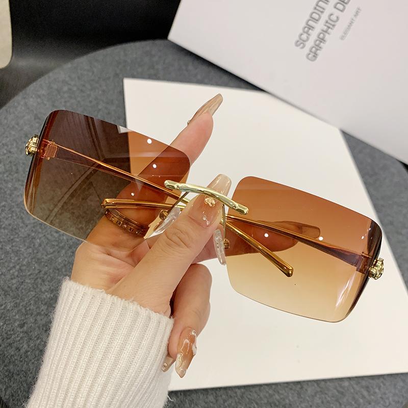 Новые солнцезащитные очки с особой безрамочной кромкой и металлической оправой, декоративные солнцезащитные очки с головой леопарда для мужчин и женщин 90283