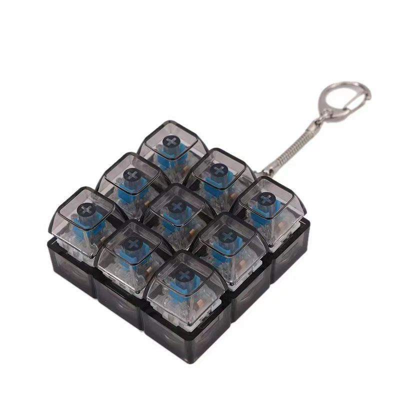 Unzip The Mechanical Keyboard With Light, Press The Keychain, And The Personalized Fully Transparent Light Unzips The Toy Schoolbag Keychain.