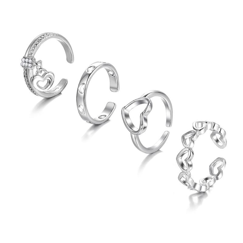 4-Piece Set Of Creative Hollowed-Out Heart Rings Featuring Minimalist Style With Open Knuckles Index Finger Exuding Elegance