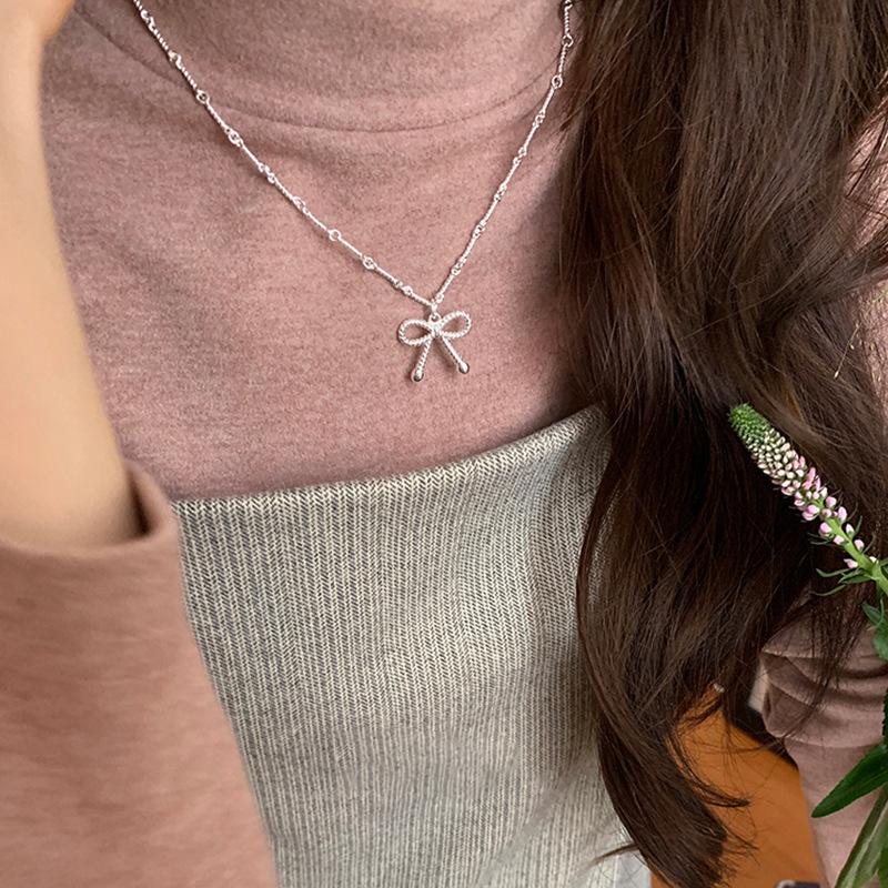 Милое и крутое ожерелье с бантом в виде спирали, женский нишевый дизайн, чувство легкости, роскошь, элегантность, индивидуальность, мода, цепочка на шею, цепочка на ключицу