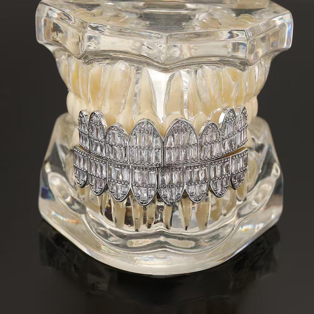 European and American Trendy HIOHOP 18K Gold Plated Hip Hop Grillz with Copper Inlaid Square Rhinestones.