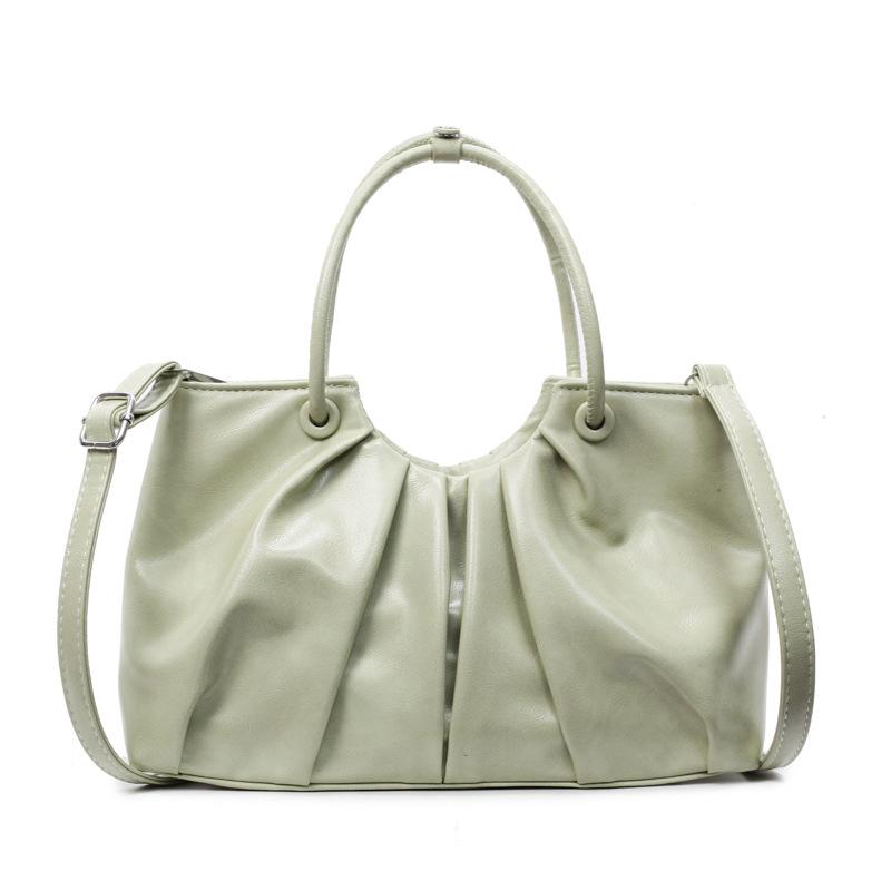 Корейская версия нишевой дизайнерской плиссированной сумки в иностранном стиле, женская универсальная сумка-мессенджер для通勤 из масляной вощеной кожи с чувством стиля