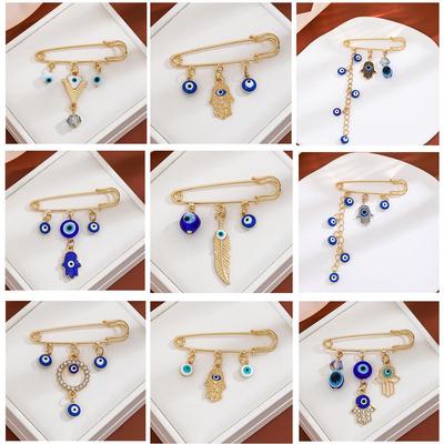 Брошь-кисточка из синих стразов высокого класса: Европейская и американская брошь-свитер «Глаз дьявола»