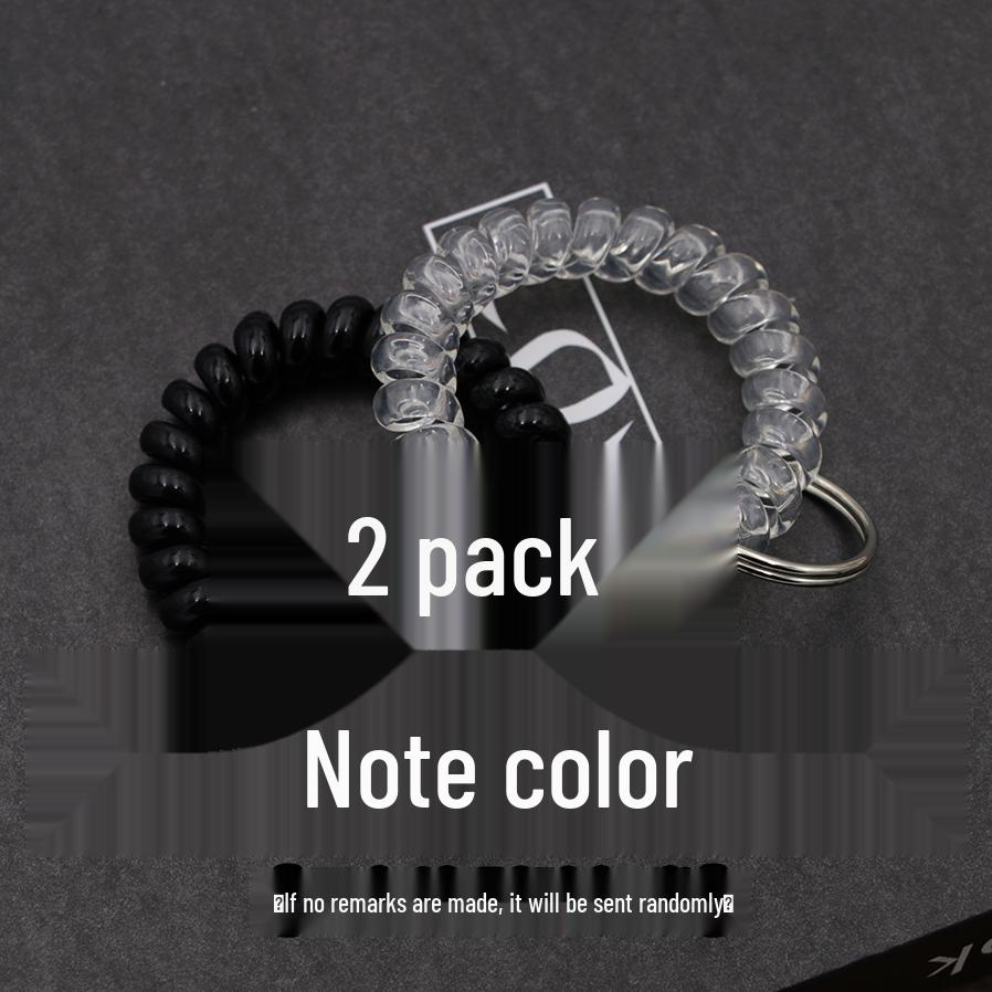 Минималистичный браслет-брелок и резинка для волос в виде пружинного механизма