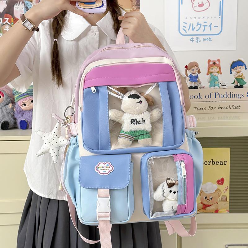 Schoolbag schoolbag Korean version of girls cute bear doll canvas backpack large capacity sweet junior high school backpack