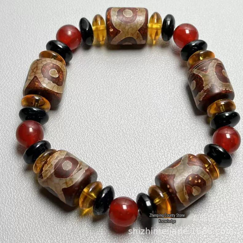 Tibetan Three-Eyed Dzi Beads Unisex Bracelet with Dragon Pattern Ice Flower Agate and Retro Ethnic Style in Red and Yellow.