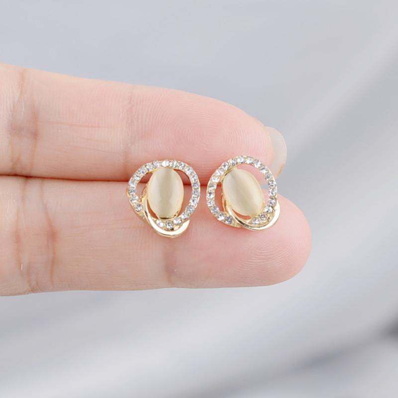 Trendy Small Oval Opal Stud Earrings for Women Rhinestones Crystal Twist Metal Hollow Irregular Geometry Earrings Jewelry