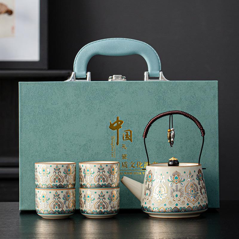 Dunhuang gold and silver wrong beam pot, one pot, four cups of bronzing and silver gift box, hospitality, business gifts, kung fu tea set